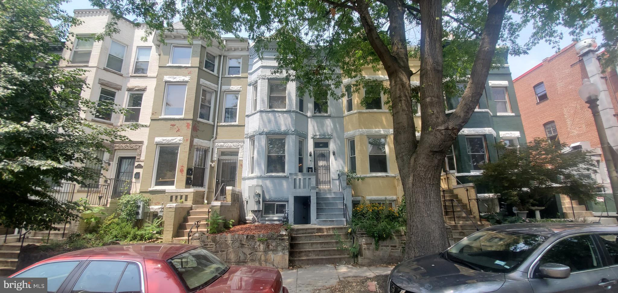 17 Quincy Place Northwest, Unit B Washington, DC 20001 - Photo 21 of 22 a view of a car parked on the side of a street