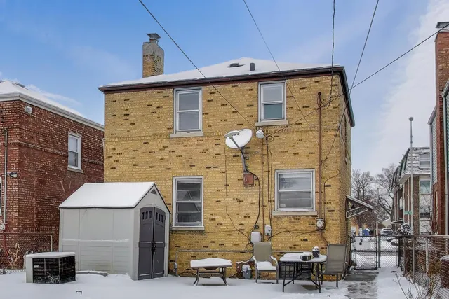 a front view of a building with parking space
