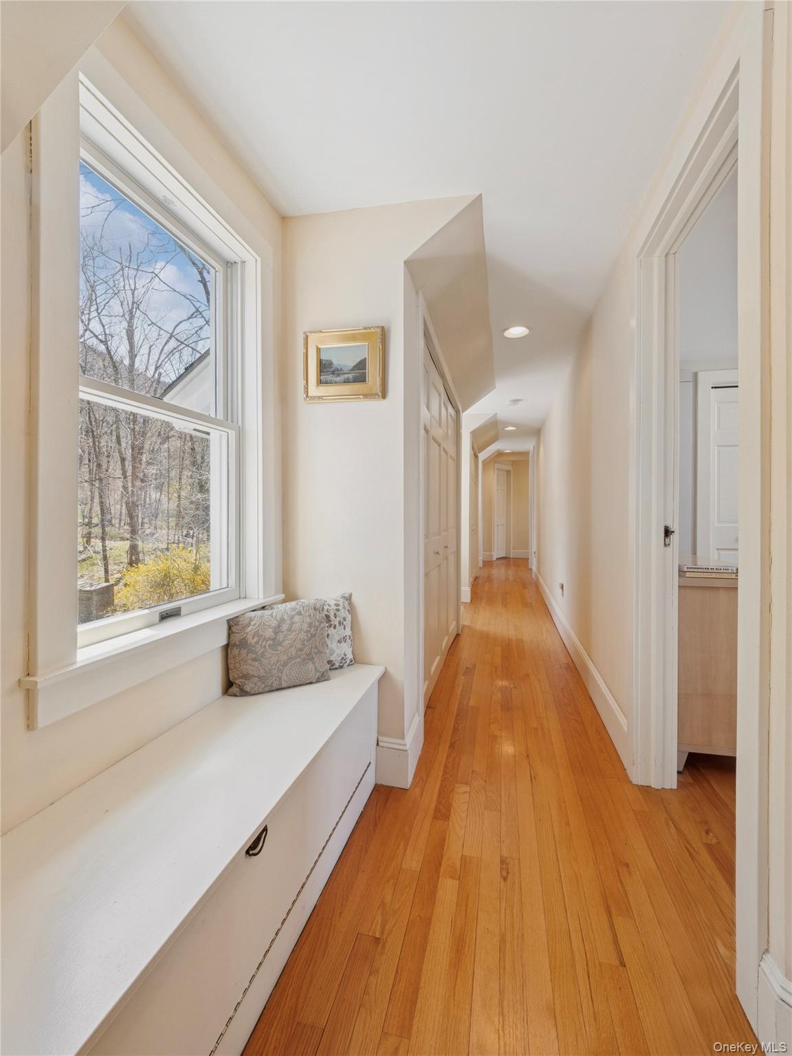 8 Manitou Ridge Garrison, NY 10524 - Photo 17 of 32 a spacious bedroom with a bed and a window