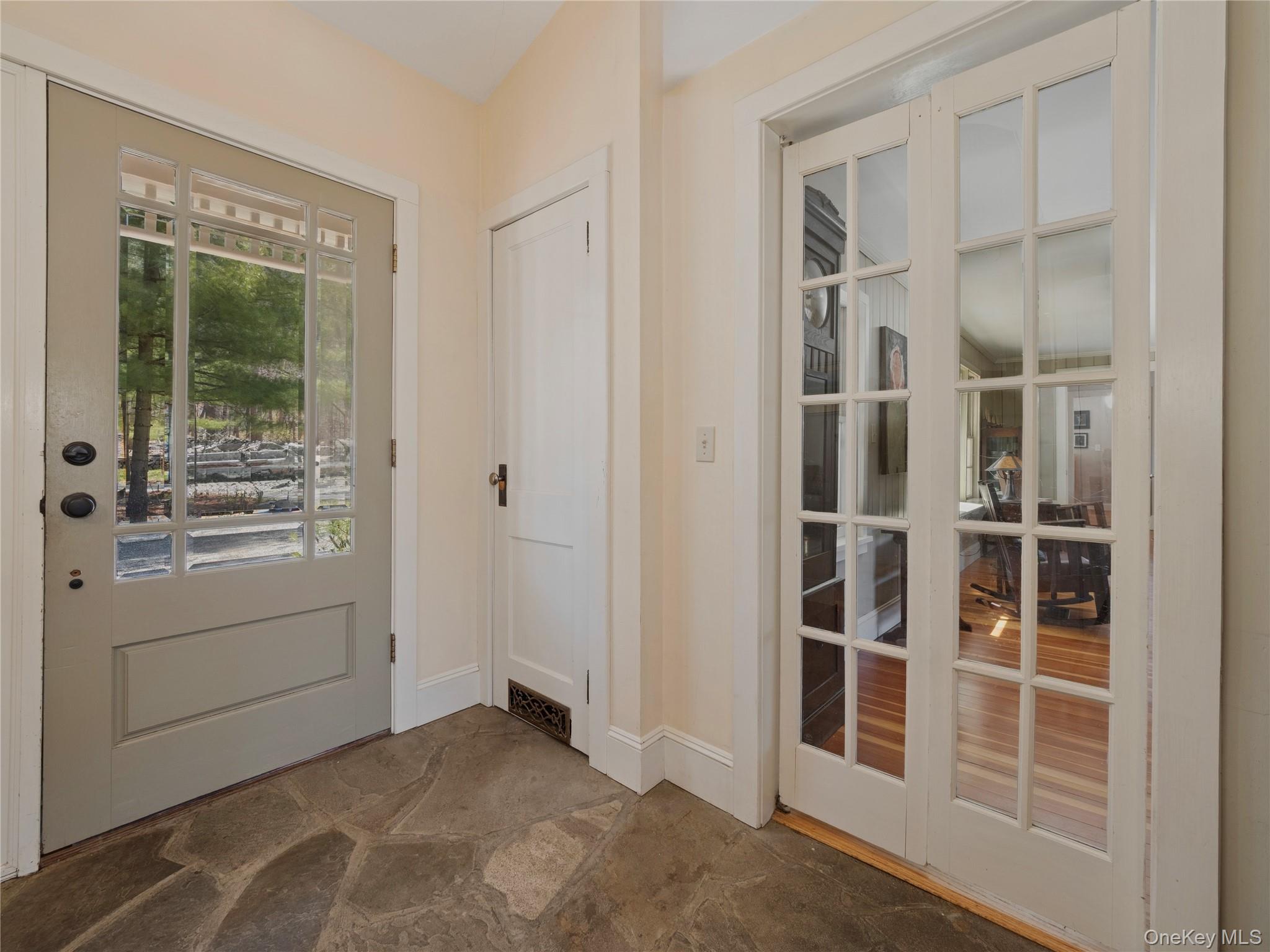 8 Manitou Ridge Garrison, NY 10524 - Photo 3 of 32 Main entry featuring stone floors with living room access