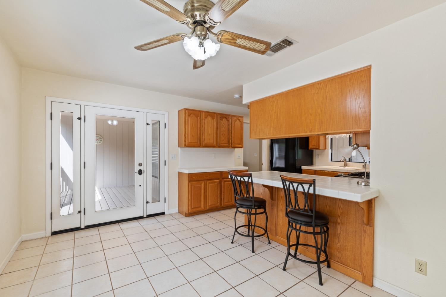 40809 Jean Road West Oakhurst, CA 93644 - Photo 13 of 39 a view of kitchen with cabinets stainless steel appliances and a window