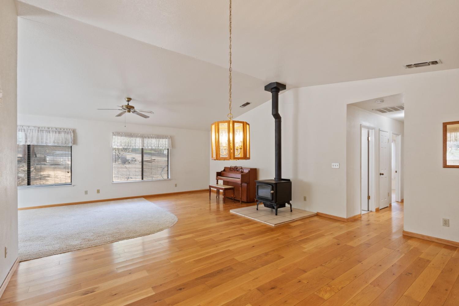 40809 Jean Road West Oakhurst, CA 93644 - Photo 19 of 39 a living room with furniture and wooden floor