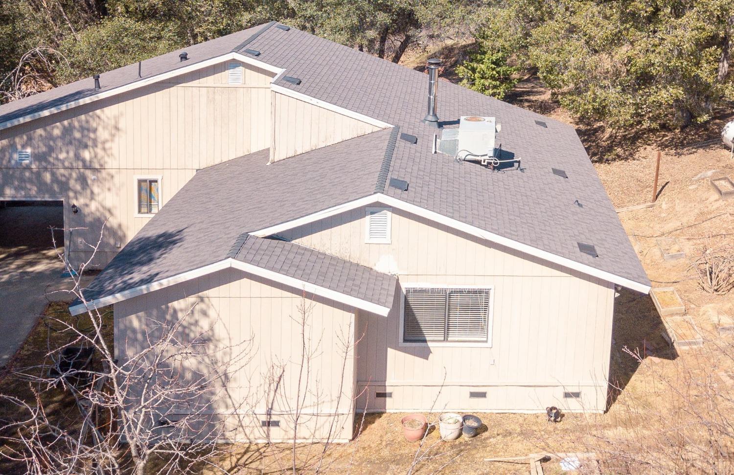 40809 Jean Road West Oakhurst, CA 93644 - Photo 2 of 39 a house view with a outdoor space