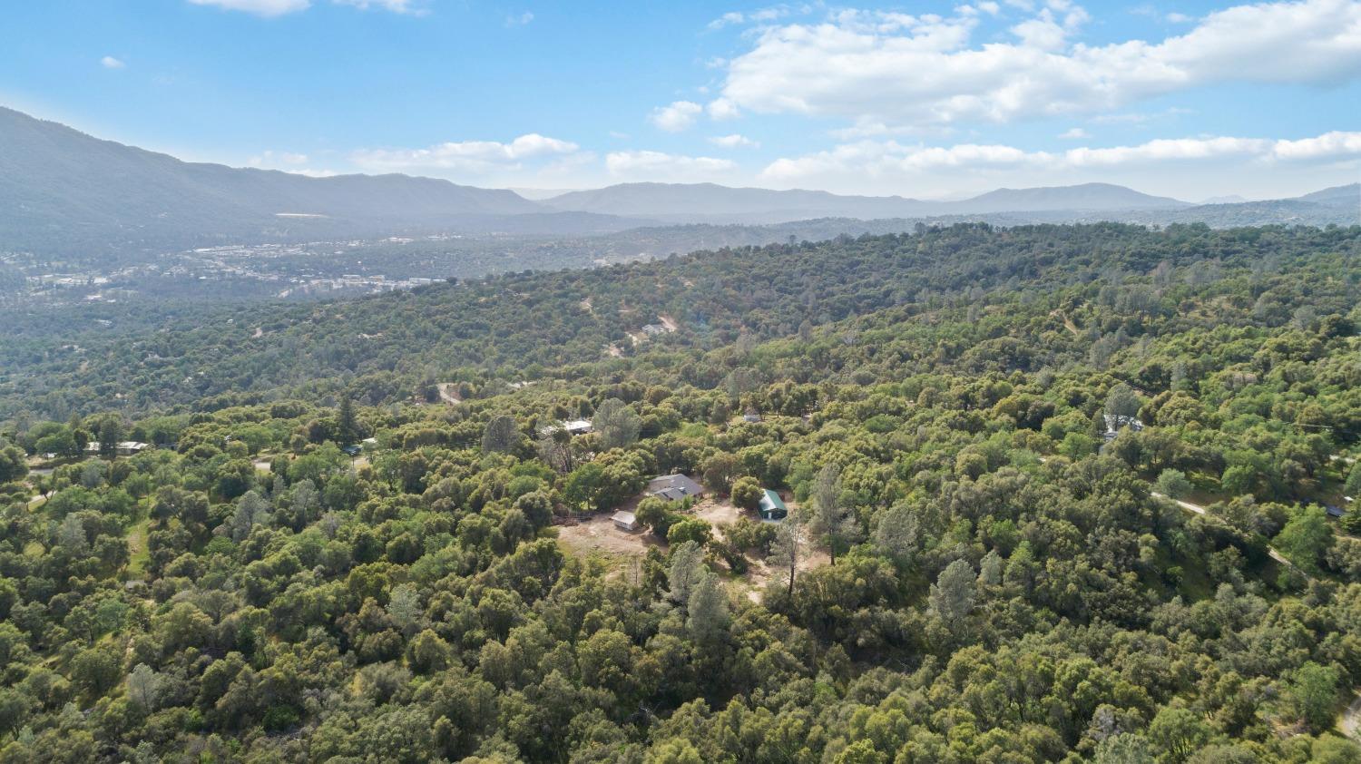 40809 Jean Road West Oakhurst, CA 93644 - Photo 37 of 39 a view of a mountain in the distance in a field