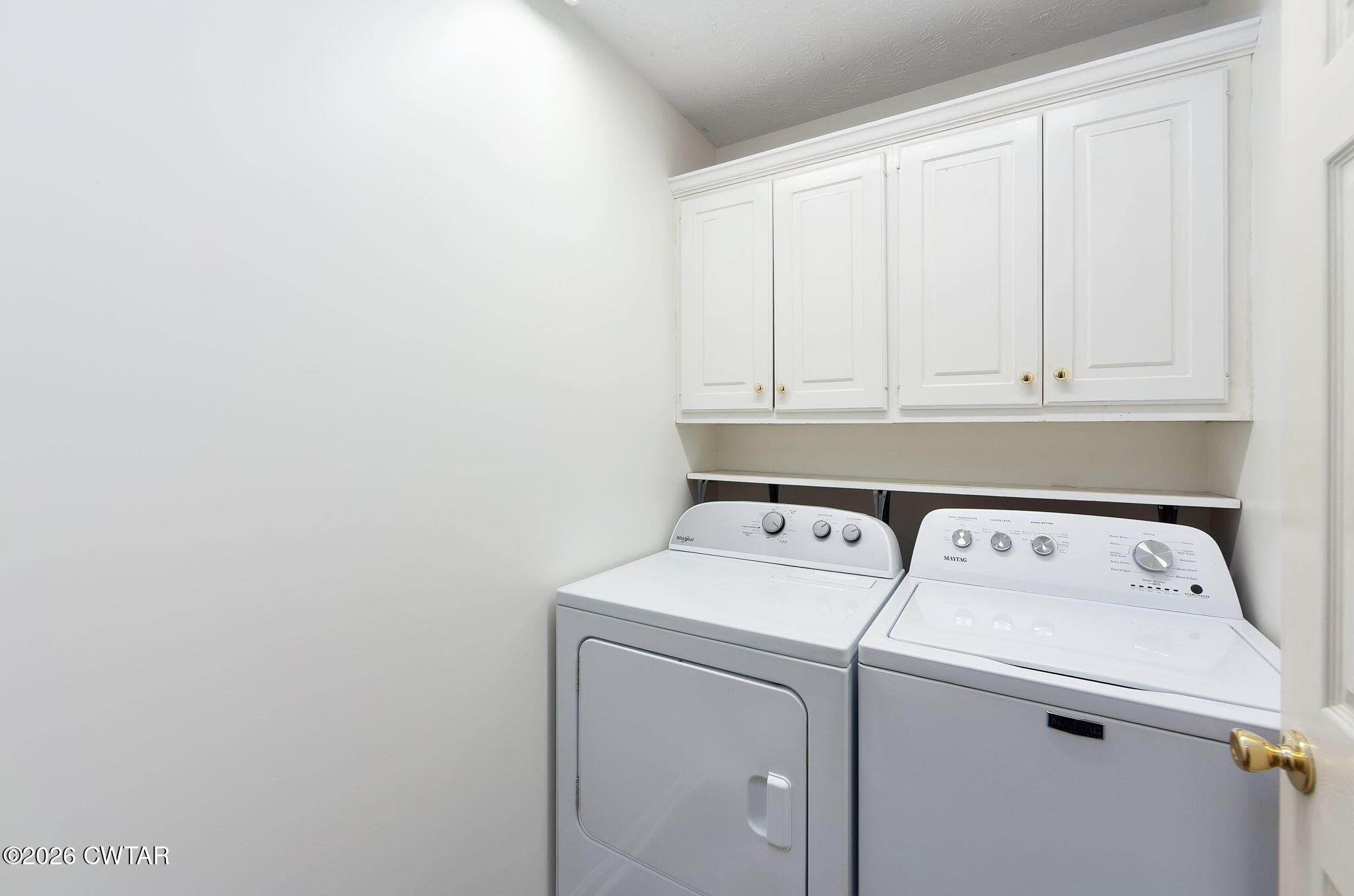 96 Sundown Drive Jackson, TN 38305 - Photo 21 of 28 a utility room with dryer and washer