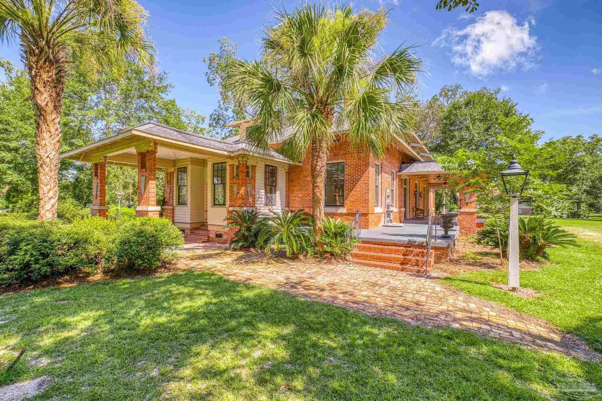 1701 Sowell Road Brewton, AL 36426 - Photo 2 of 72 a front view of a house with a yard