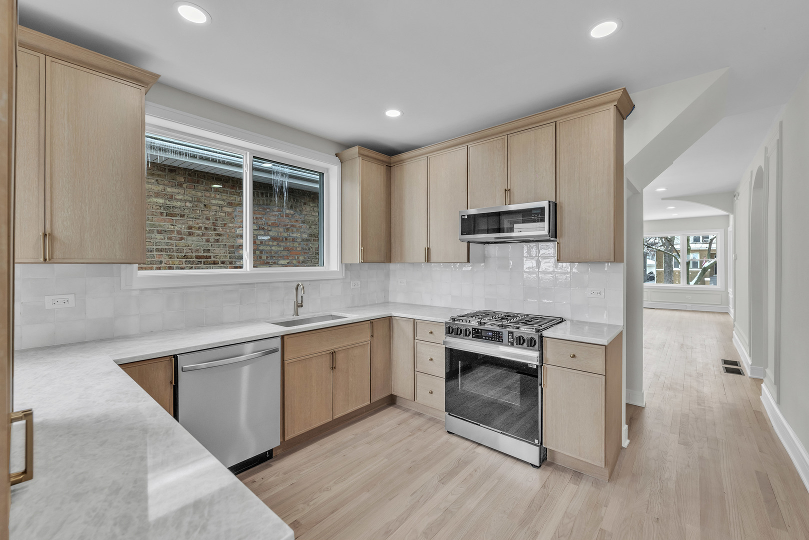 2513 Keystone Avenue North Riverside, IL 60546 - Photo 15 of 32 a kitchen with stainless steel appliances granite countertop a stove and a sink