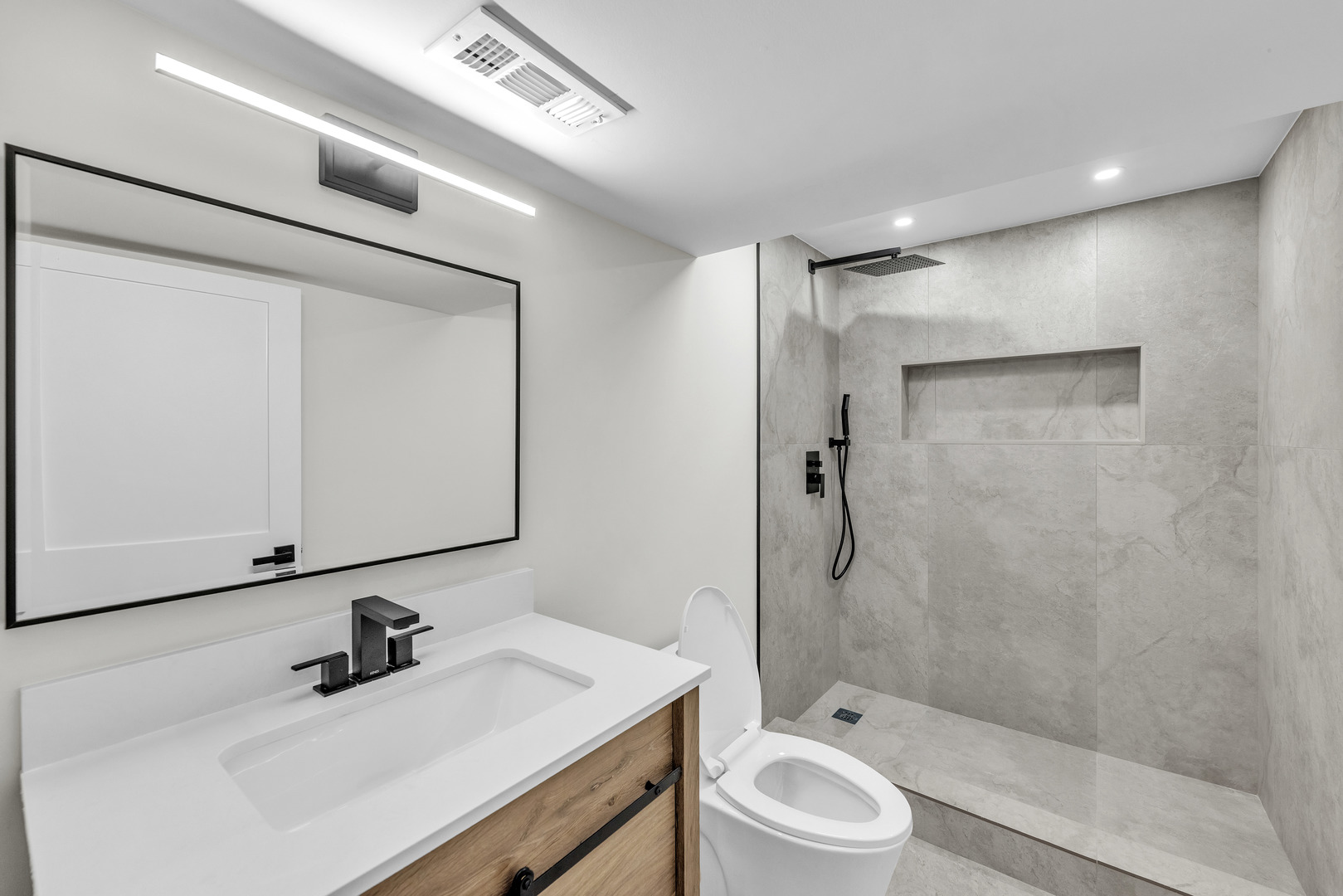 2513 Keystone Avenue North Riverside, IL 60546 - Photo 26 of 32 a bathroom with a sink a toilet and shower