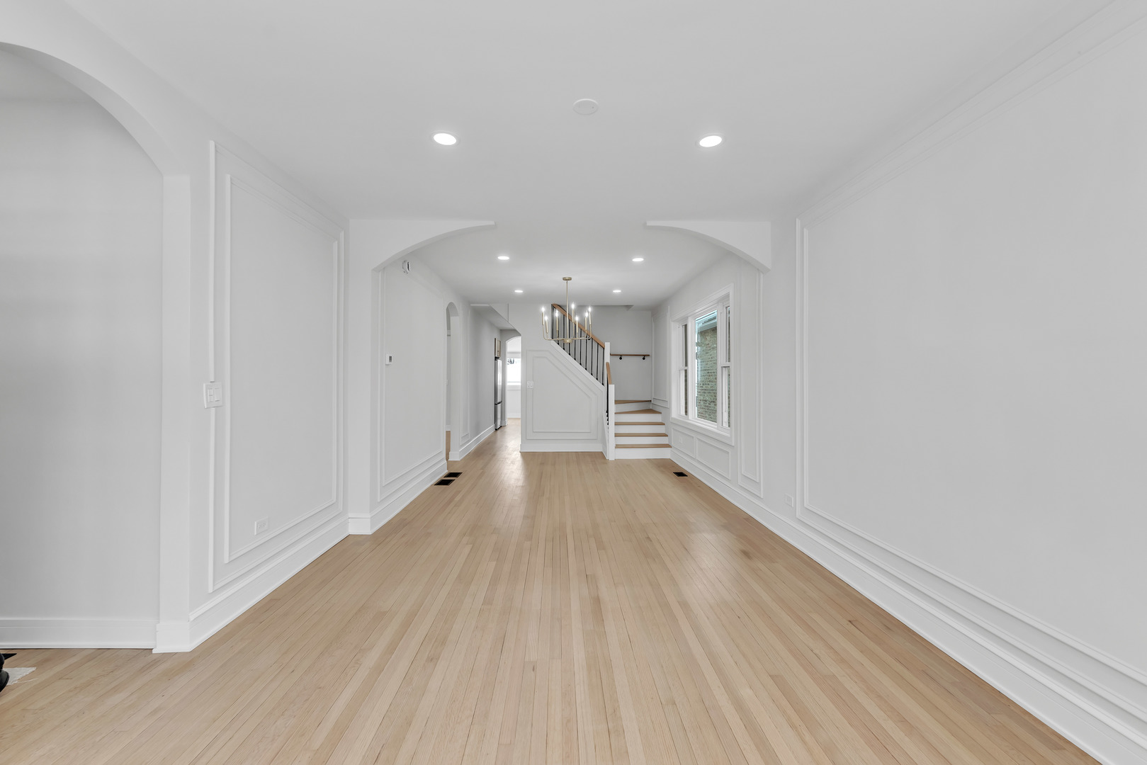 2513 Keystone Avenue North Riverside, IL 60546 - Photo 6 of 32 a view of a hallway with wooden floor