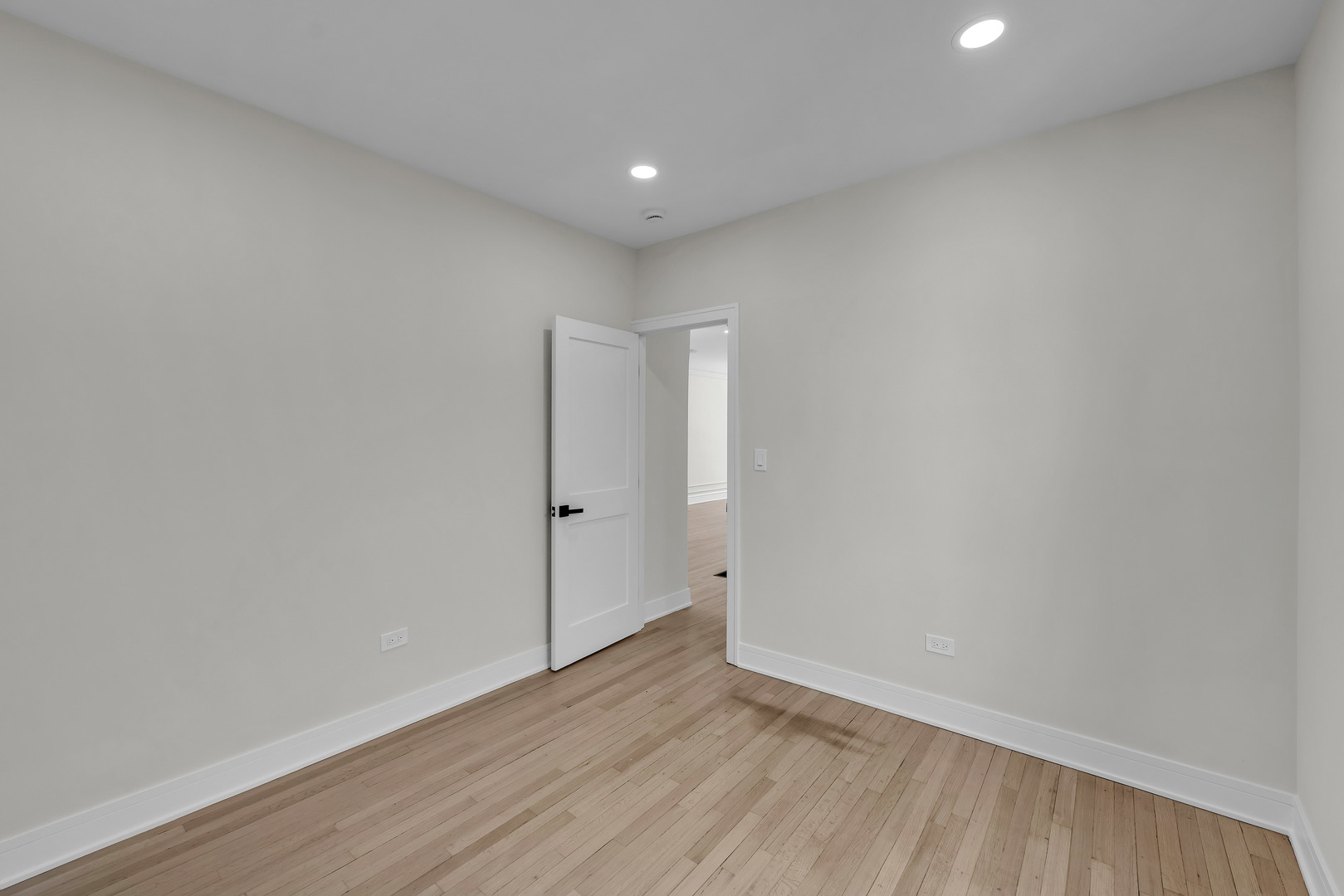 2513 Keystone Avenue North Riverside, IL 60546 - Photo 9 of 32 a view of an empty room with wooden floor