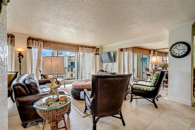 a kitchen with granite countertop a sink and cabinets