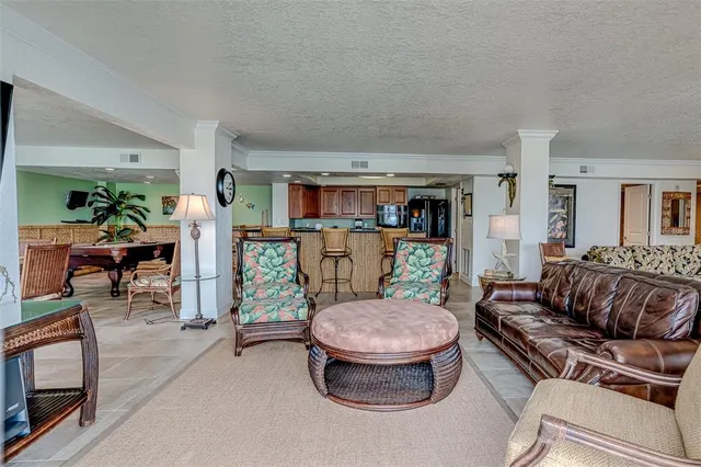 a bedroom with a bed and a table