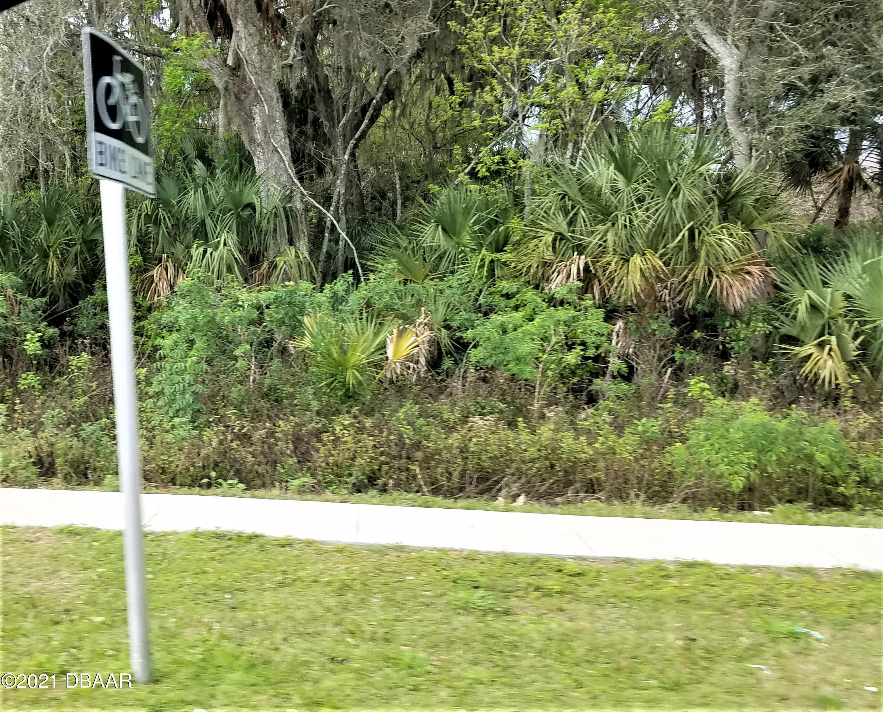 1802 South Nova Road South Daytona, FL 32119 - Photo 5 of 5 a view of outdoor space with a lake view