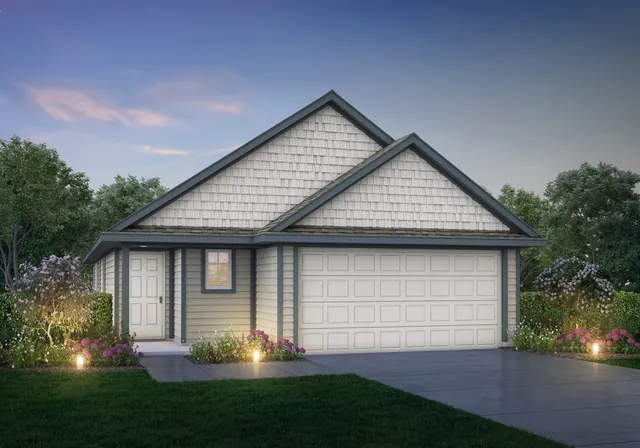 a view of a house with a small yard and potted plants