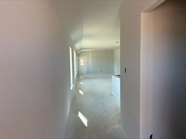 a view of a bathroom with mirror
