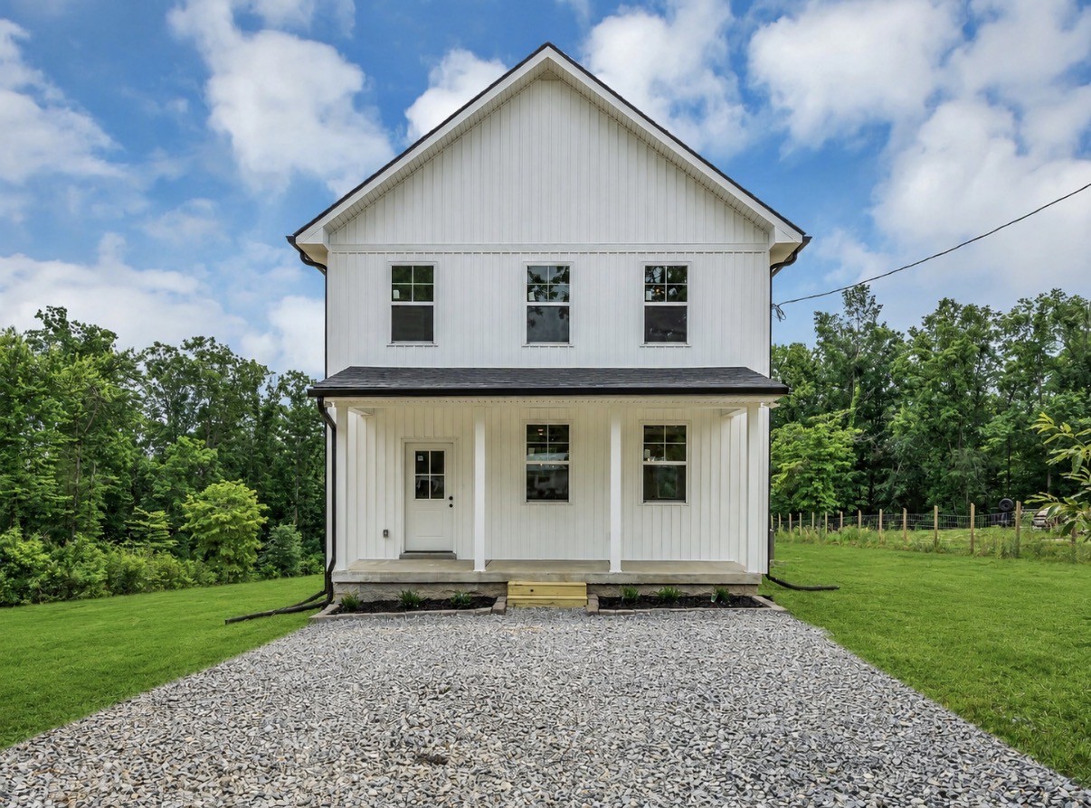 5800 Sanders Road Lyles, TN 37098 - Photo 1 of 28 a view of a house with a yard