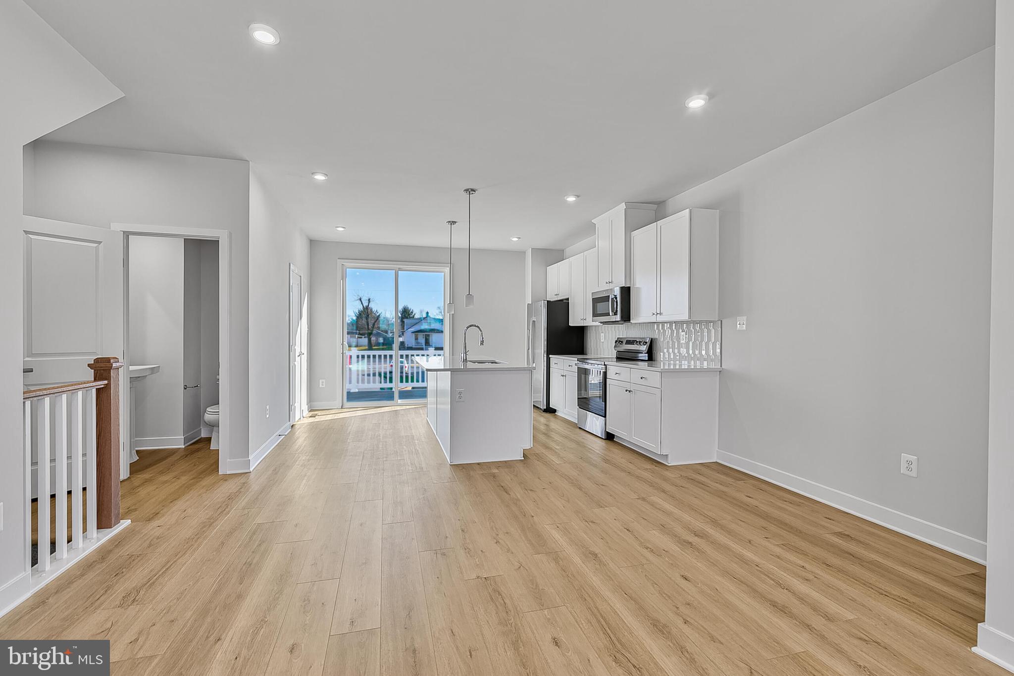 1101 Oasis Avenue Ranson, WV 25438 - Photo 18 of 39 a view of a kitchen with wooden floor