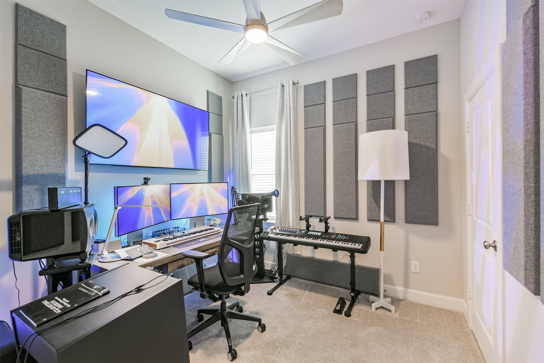 15611 Rising Wren Court Conroe, TX 77302 - Photo 32 of 38 a view of a workspace with furniture and a window