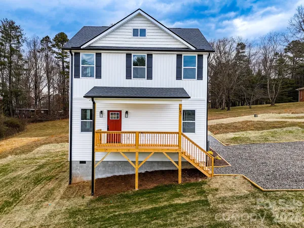 a view of a house with a swimming pool