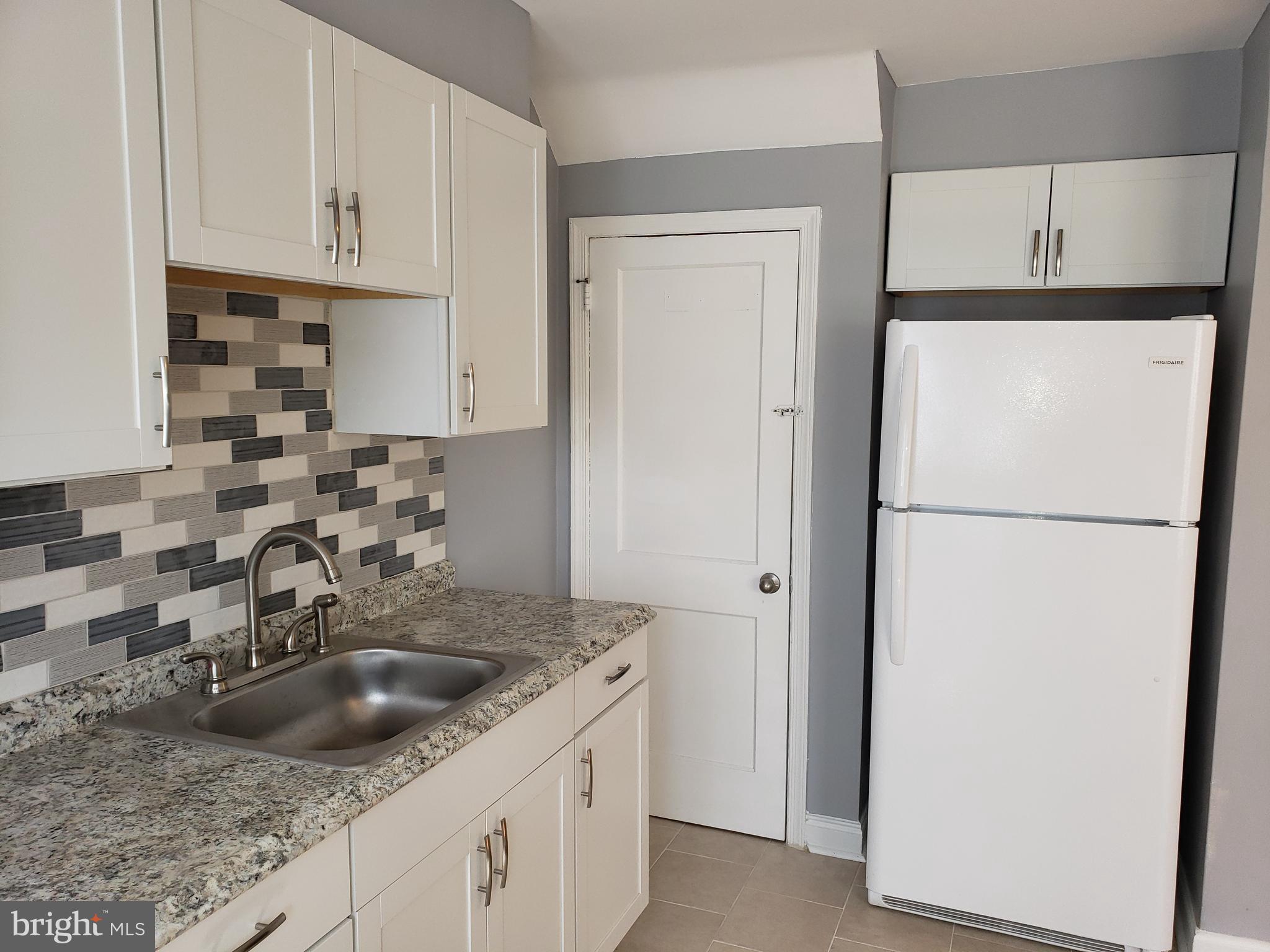 1909 Larkhall Road Baltimore, MD 21222 - Photo 14 of 41 Beautiful backsplash and countertops.