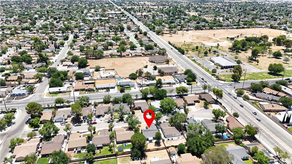 1025 Lightcap Street Lancaster, CA 93535 - Photo 11 of 13 an aerial view of residential houses with outdoor space
