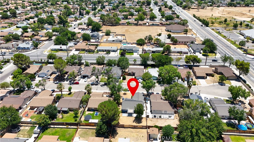 1025 Lightcap Street Lancaster, CA 93535 - Photo 12 of 13 an aerial view of residential houses with outdoor space