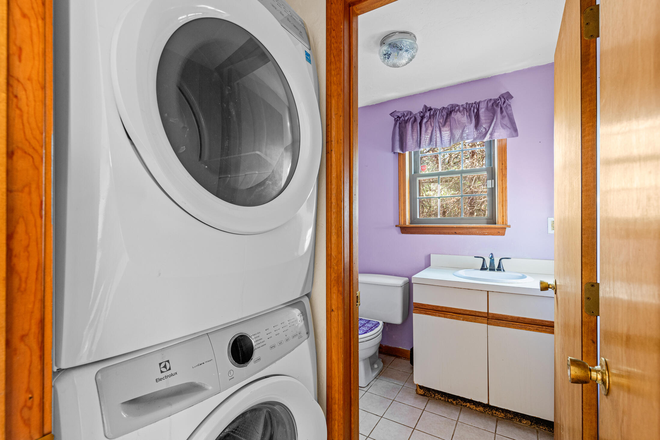 195 Falmouth Road, Unit 19F Mashpee, MA 02649 - Photo 11 of 25 a bathroom with a sink and a mirror