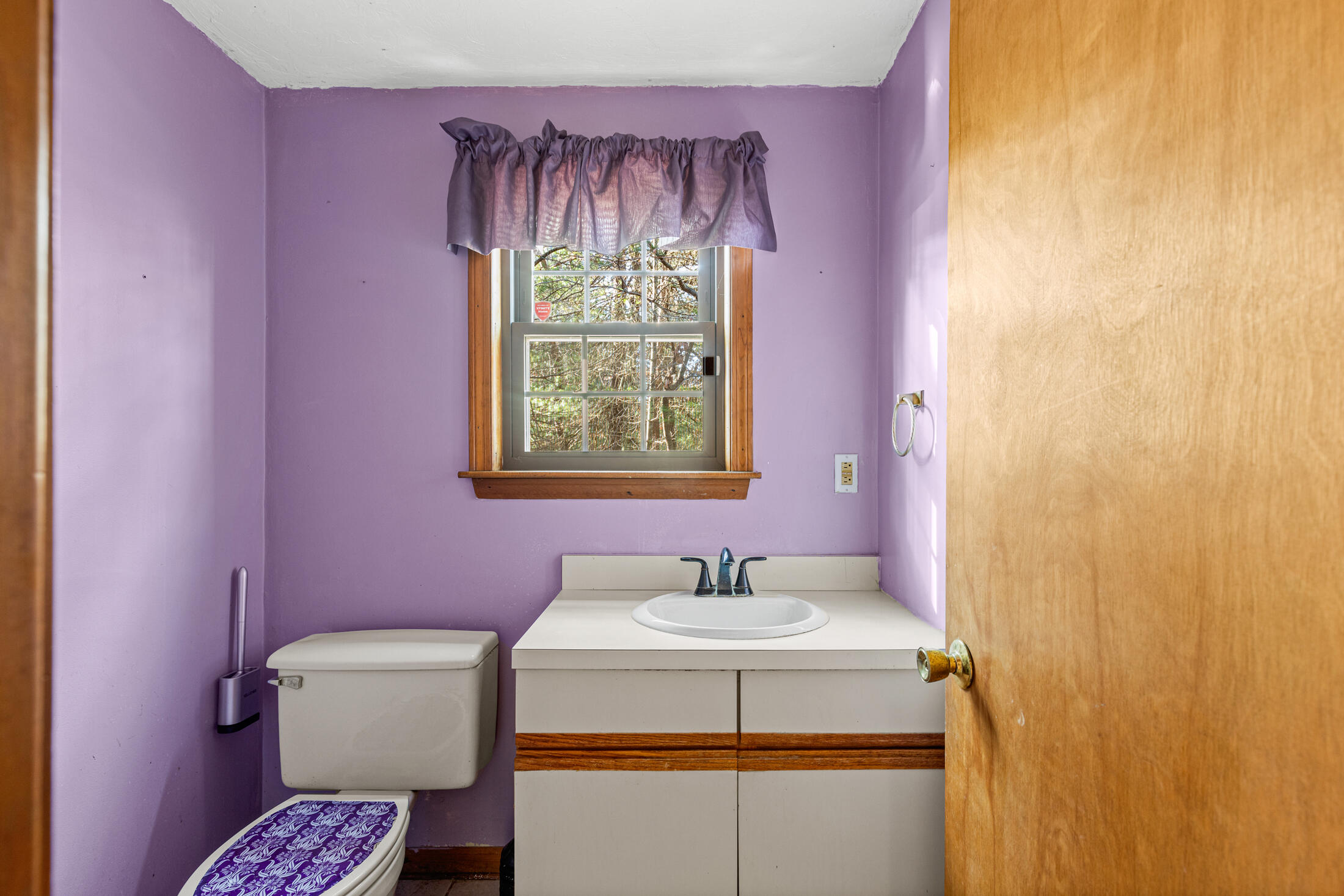 195 Falmouth Road, Unit 19F Mashpee, MA 02649 - Photo 12 of 25 a bathroom with a sink mirror vanity and toilet