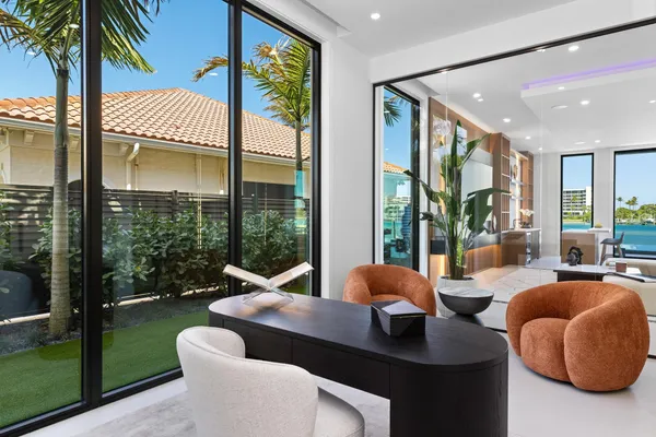 a front view of house with yard patio and dining table
