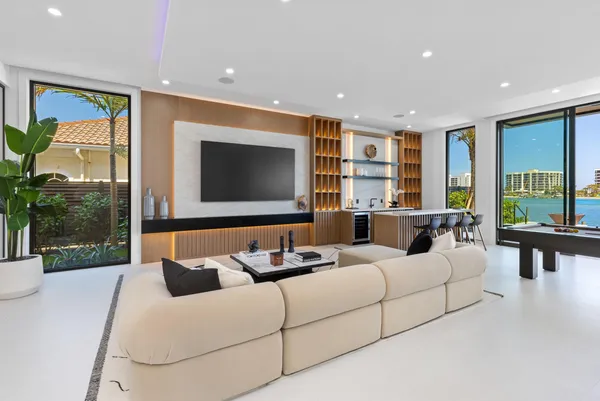 a view of a lake with a house in the background