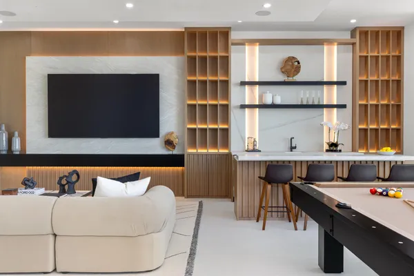 a view of an outside dining space with furniture