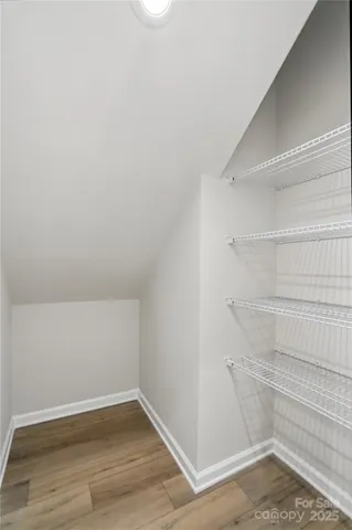 a view of an empty walk in closet