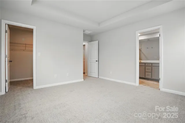 an empty room with closet area