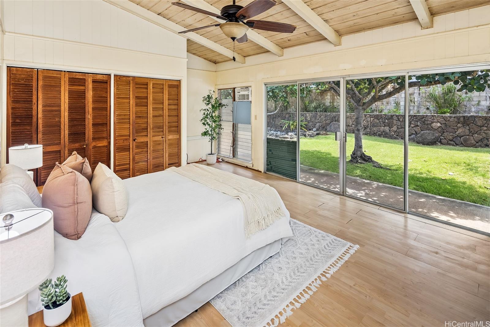 153 Hanapepe Loop Honolulu, HI 96825 - Photo 17 of 22 Bedroom with access to the backyard