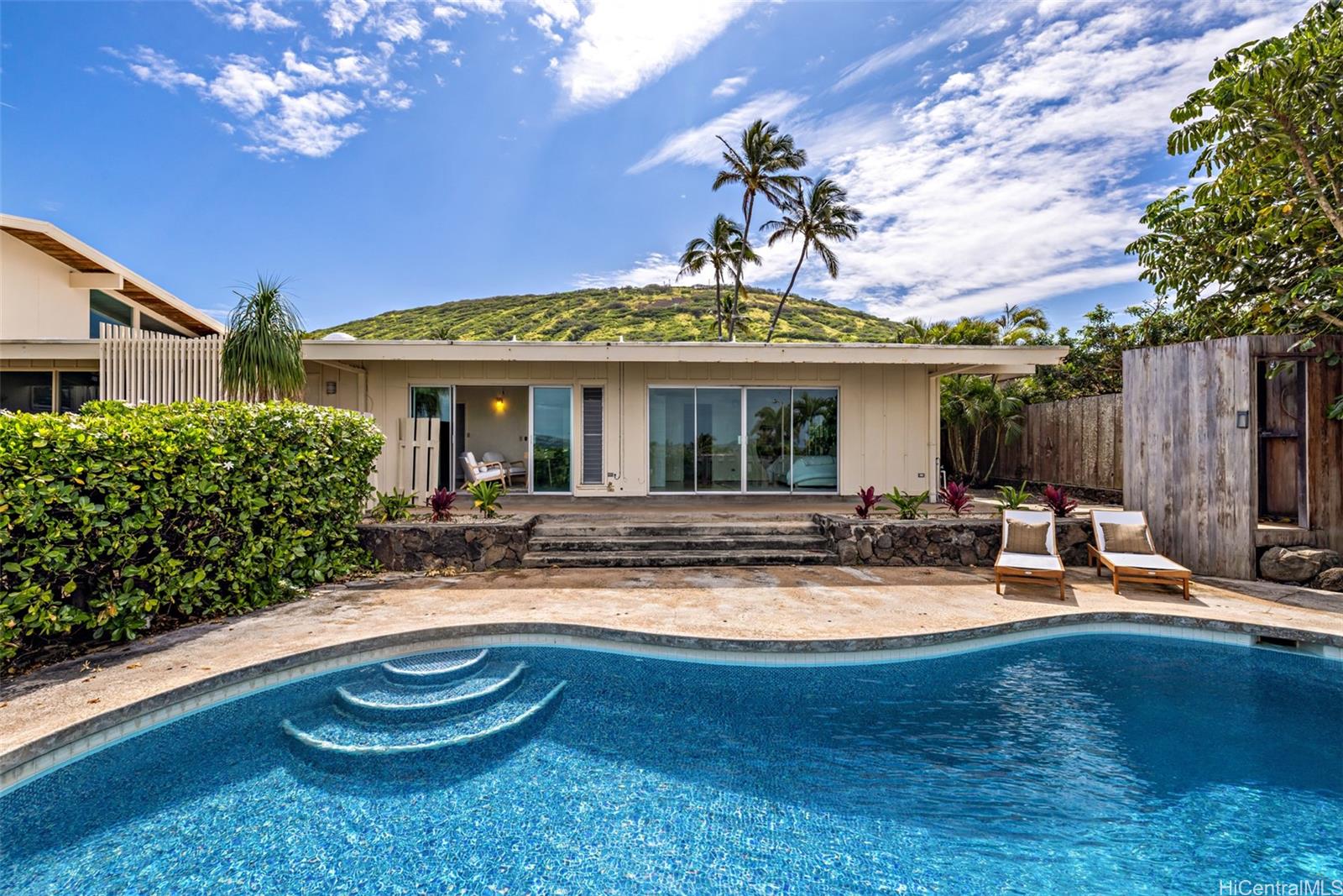 153 Hanapepe Loop Honolulu, HI 96825 - Photo 3 of 22 View of front of the home leading to the pool