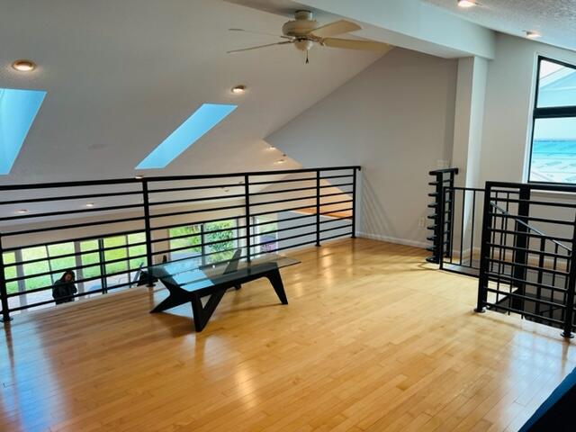400 River Edge Road Jupiter, FL 33477 - Photo 11 of 19 a room with stairs and a table