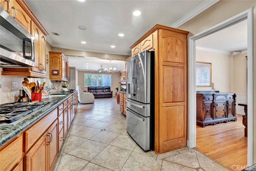 5456 Cadbury Road Whittier, CA 90601 - Photo 27 of 67 a kitchen with stainless steel appliances a refrigerator and a stove