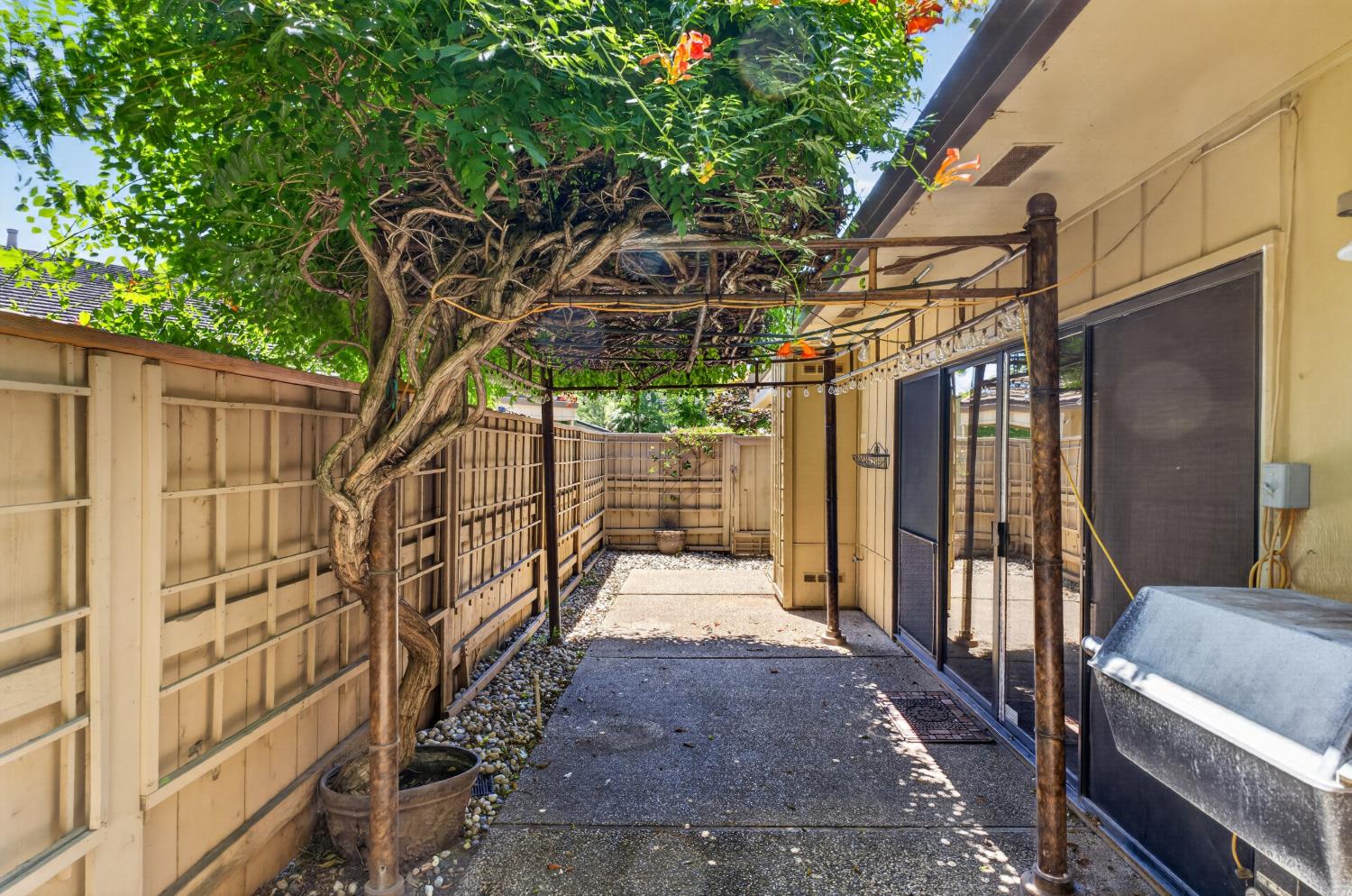 1338 Hunn Road, Unit 26 Yuba City, CA 95993 - Photo 42 of 58 Built in Gas BBQ, Oversized Sliding Glass Door Leading into the Living Room