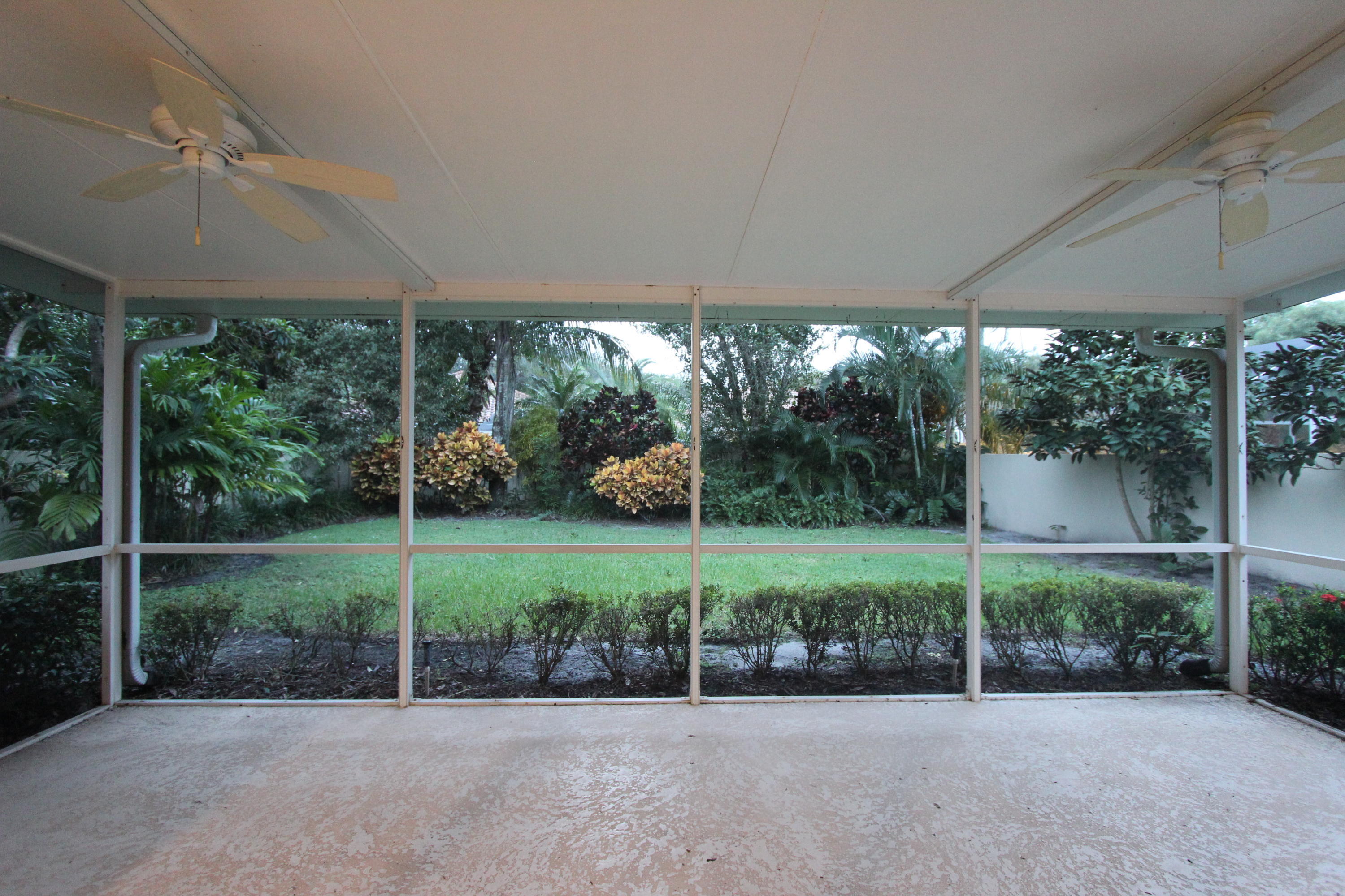 117 Hampton Circle Jupiter, FL 33458 - Photo 32 of 42 Screened Patio