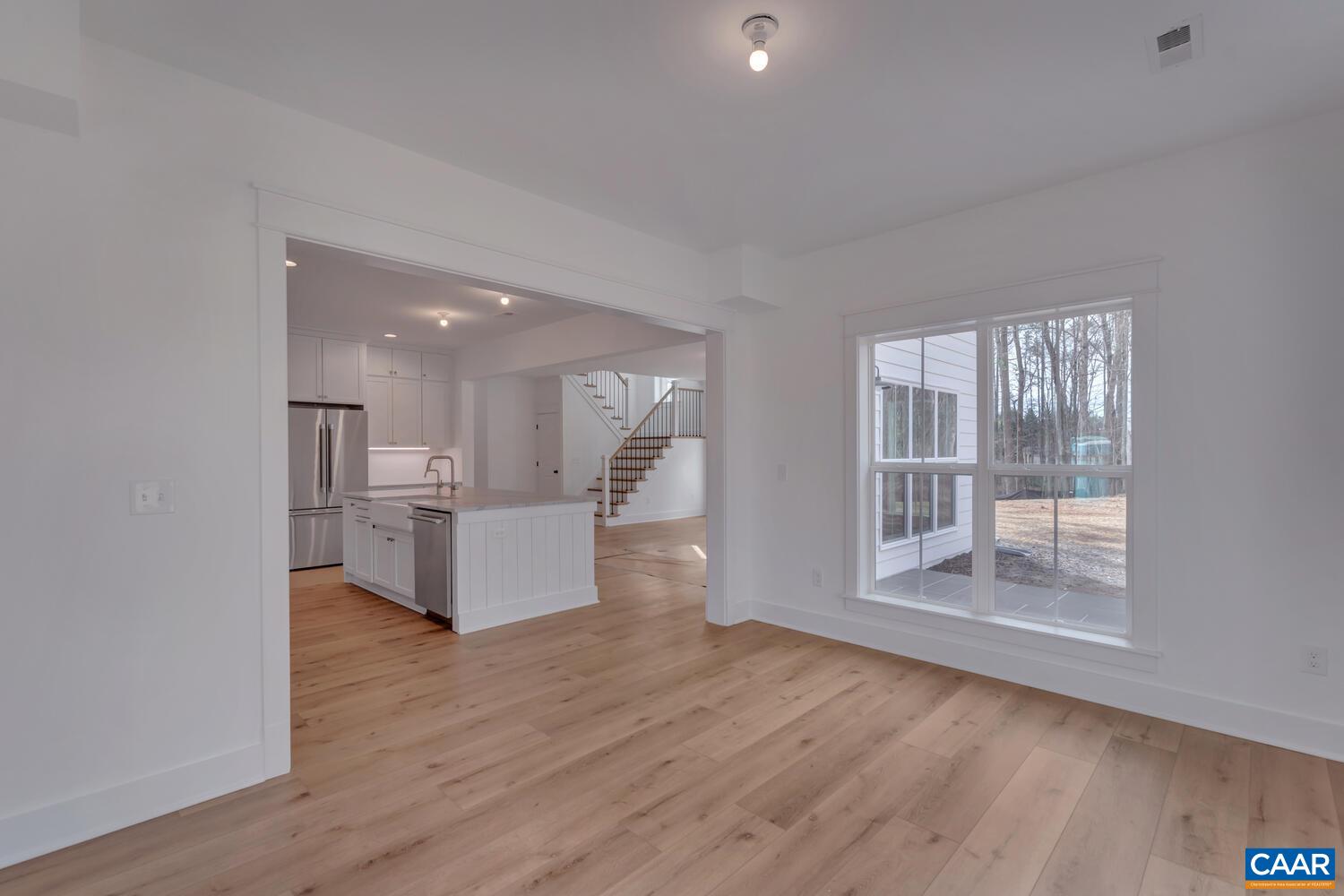 2 Jarmans Gap Road, Unit LOT 2 JARMANS GAP Crozet, VA 22932 - Photo 11 of 33 a big room with wooden floor and windows