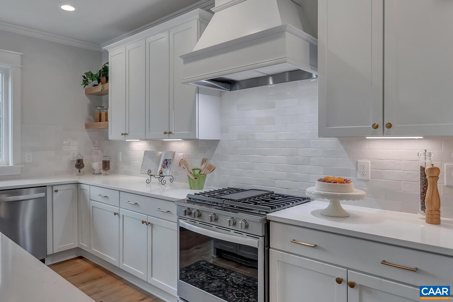 2 Jarmans Gap Road, Unit LOT 2 JARMANS GAP Crozet, VA 22932 - Photo 14 of 33 a kitchen with stainless steel appliances granite countertop a sink stove and cabinets