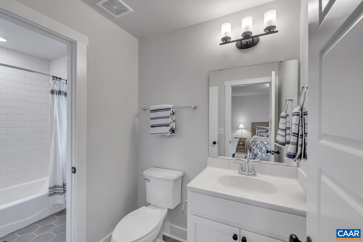 2 Jarmans Gap Road, Unit LOT 2 JARMANS GAP Crozet, VA 22932 - Photo 18 of 33 a bathroom with a sink toilet and shower