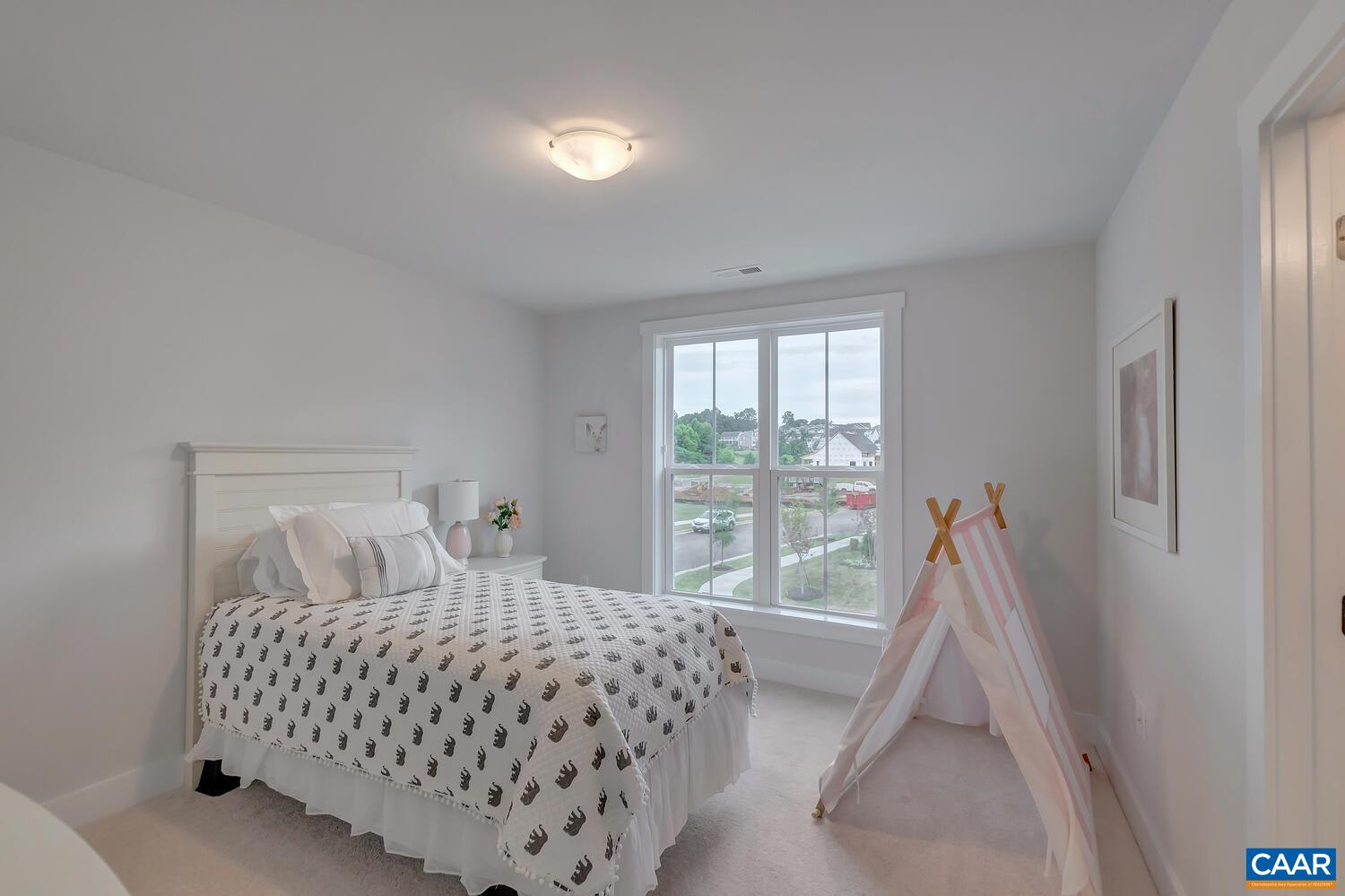 2 Jarmans Gap Road, Unit LOT 2 JARMANS GAP Crozet, VA 22932 - Photo 19 of 33 a bedroom with a bed and a large window