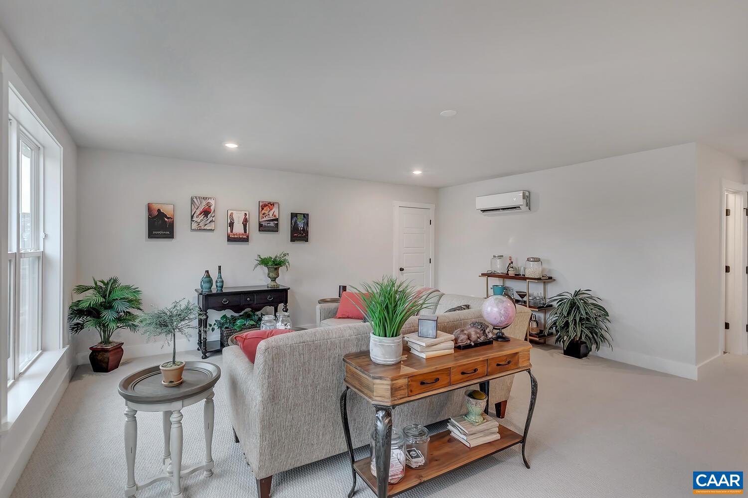2 Jarmans Gap Road, Unit LOT 2 JARMANS GAP Crozet, VA 22932 - Photo 29 of 33 a living room with furniture potted plant and a window