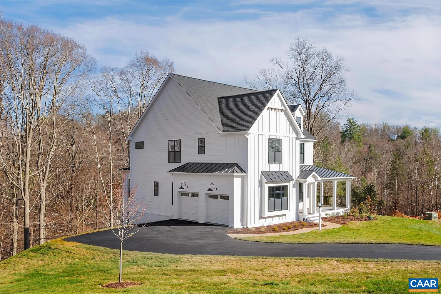2 Jarmans Gap Road, Unit LOT 2 JARMANS GAP Crozet, VA 22932 - Photo 3 of 33 a front view of a house with a yard