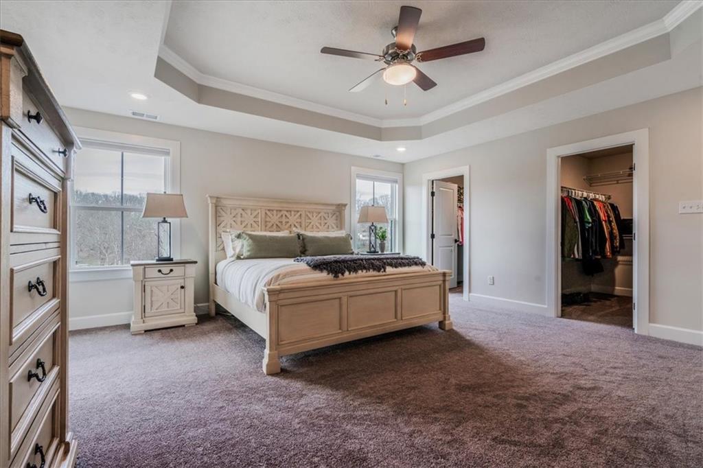 348 Juniper Way Canonsburg, PA 15317 - Photo 15 of 25 a large white bedroom with bed and a chandelier