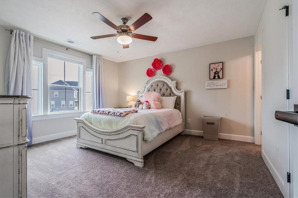348 Juniper Way Canonsburg, PA 15317 - Photo 21 of 25 a bed sitting in a bedroom next to a window