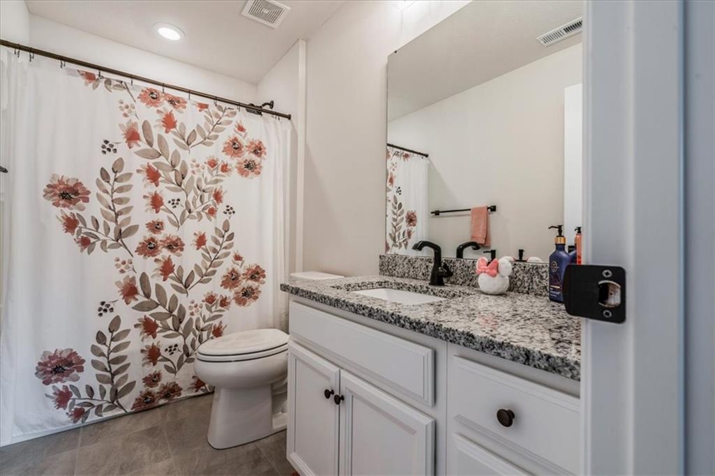 348 Juniper Way Canonsburg, PA 15317 - Photo 22 of 25 a bathroom with a granite countertop sink a toilet and a shower curtain