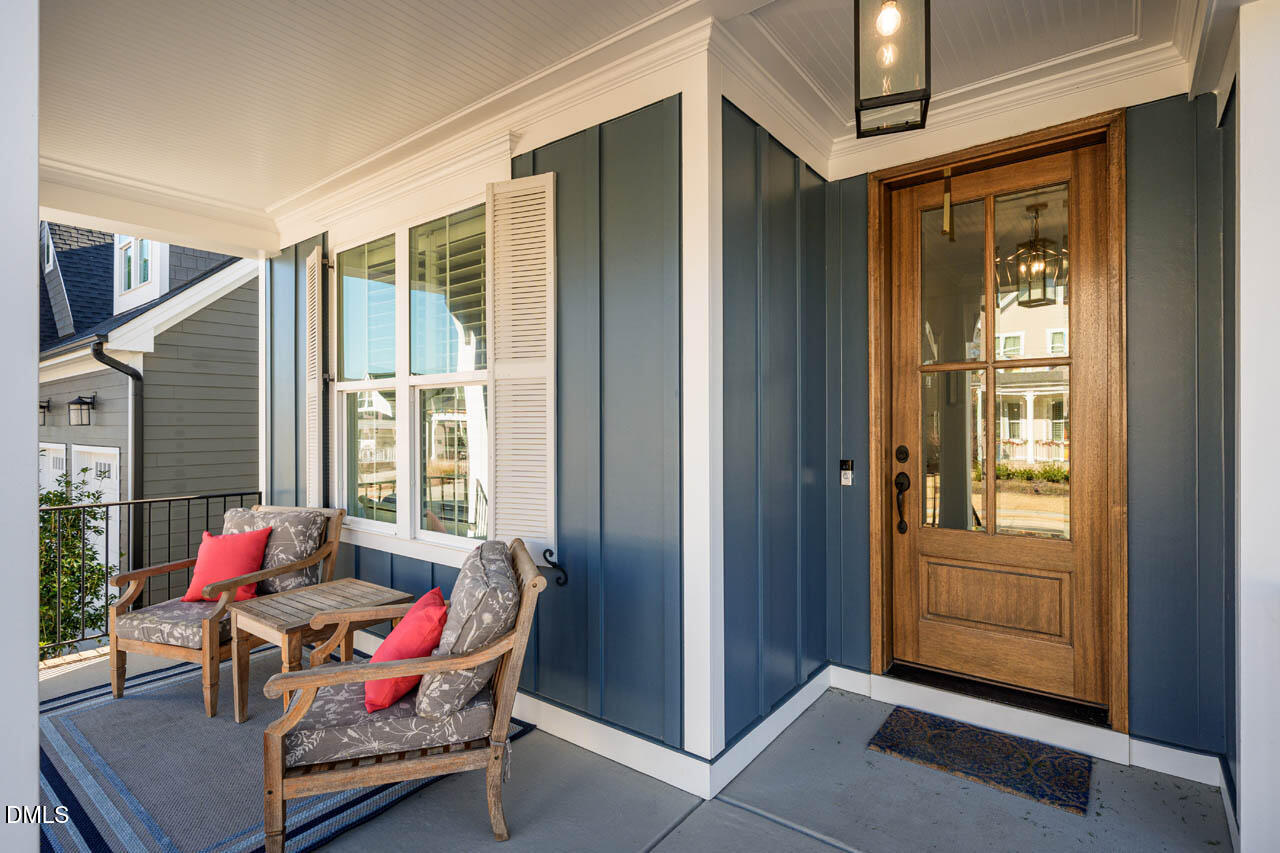 56 Post Oak Road Chapel Hill, NC 27516 - Photo 10 of 84 a living room with furniture and a window