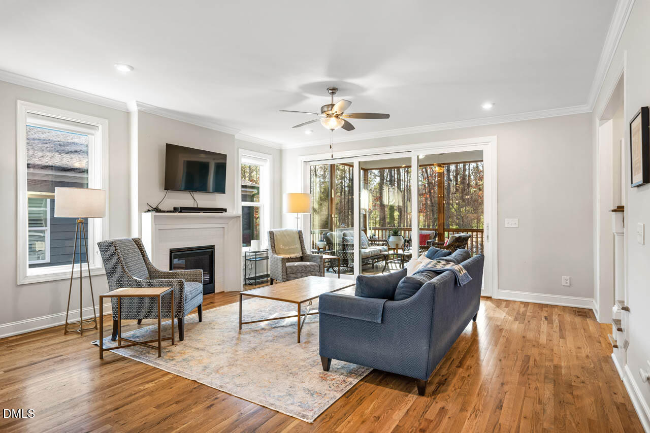 56 Post Oak Road Chapel Hill, NC 27516 - Photo 18 of 84 a living room with furniture fireplace and a flat screen tv